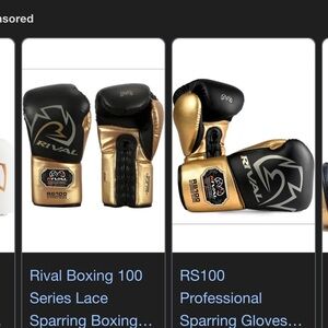 Rival RS100 Black and Gold Boxing Gloves